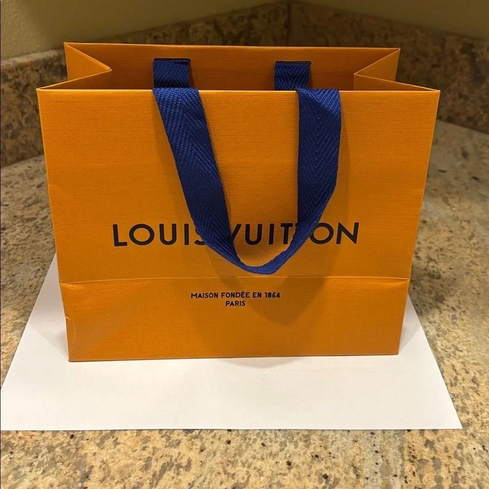 Louis Vuitton Bold Orange Bag with Blue Handles
